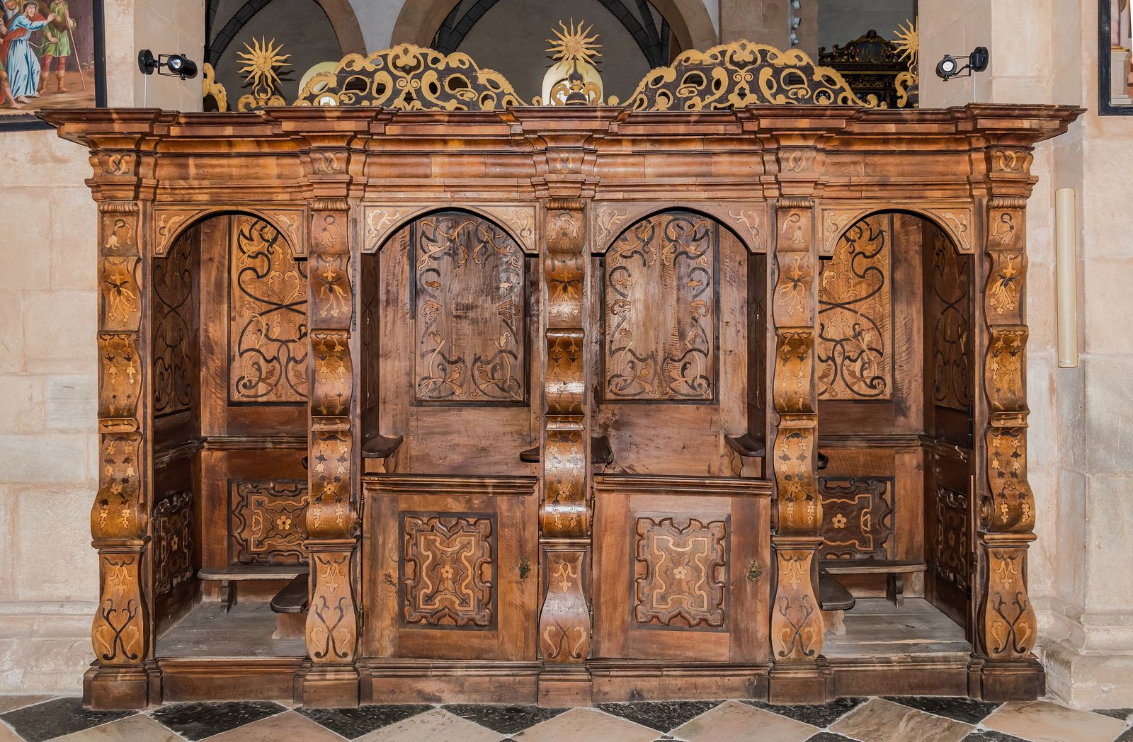 A carved wooden double confessional in Gurk Cathedral, Austria