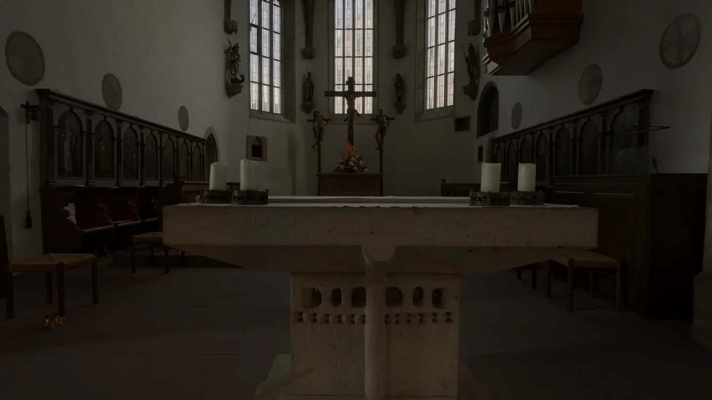 The altar of St. Moriz and the Gothic choir beyond it, with its crucifixion group and tall windows