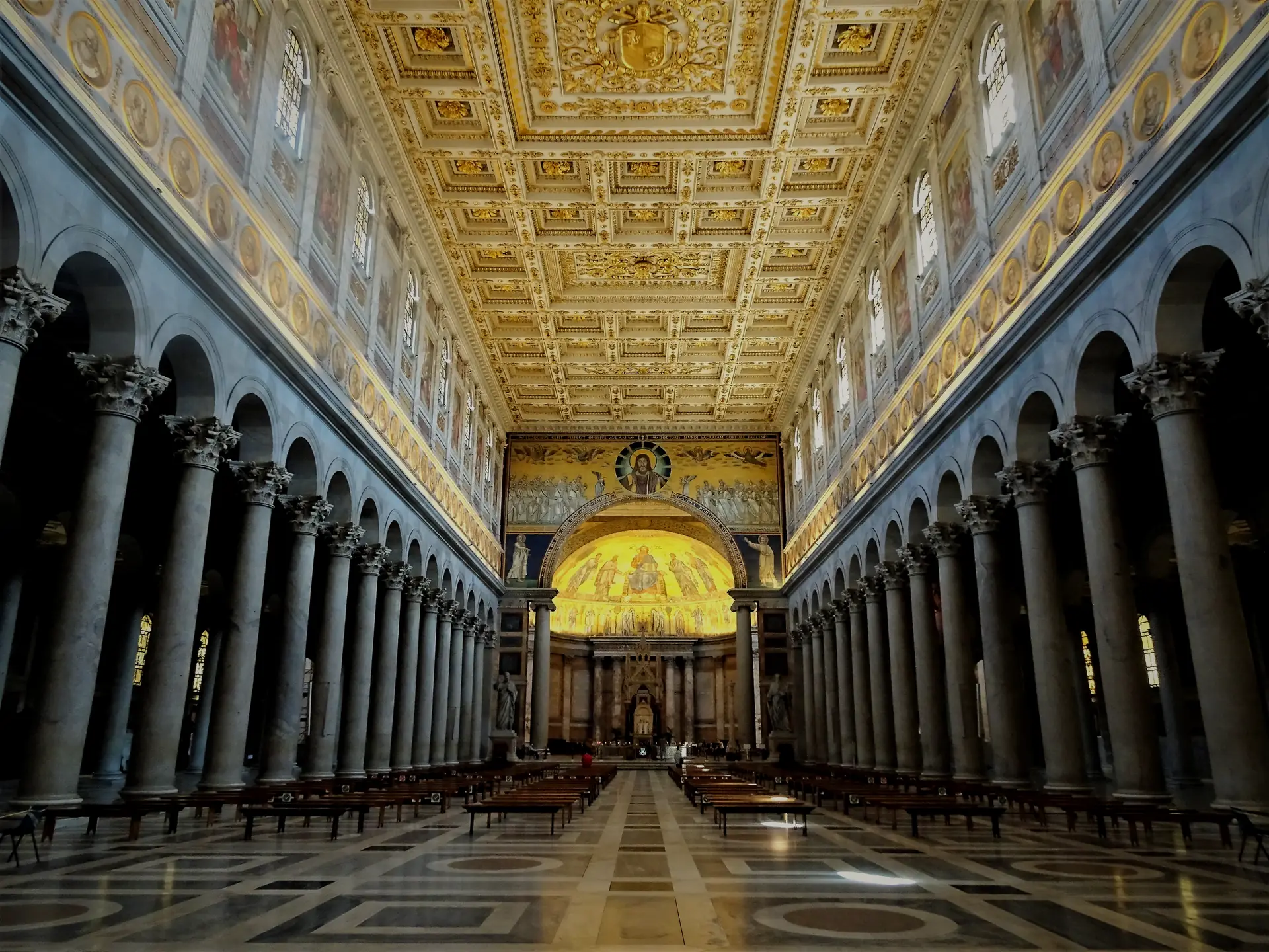 The nave of St. Paul Outside the Walls in Rome, between its rows of granite columns